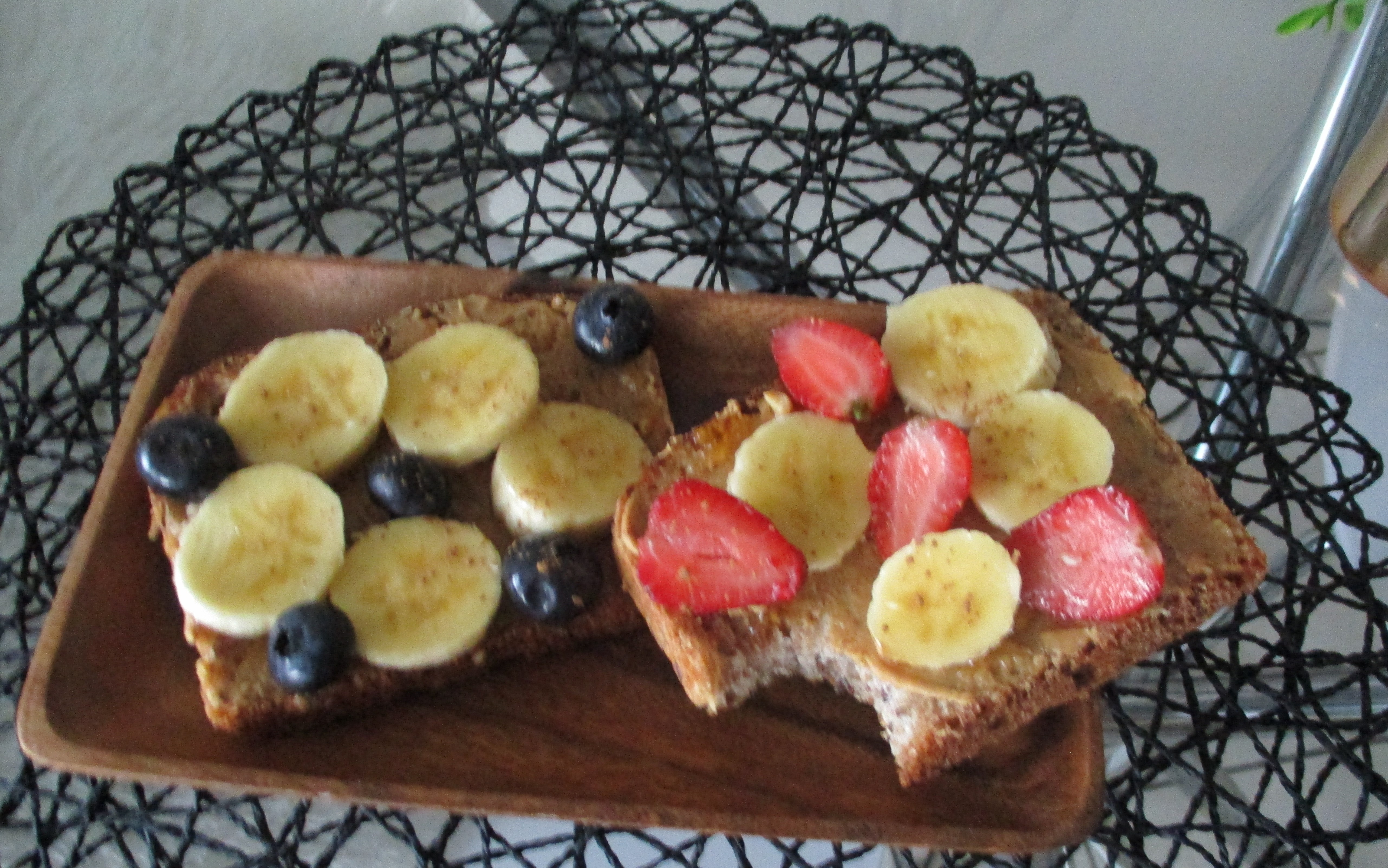Seeded Bread with peanut butter and berriesbanana